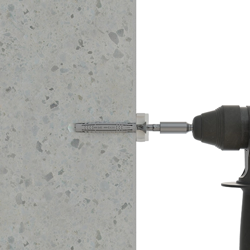 Paso 5 fijación en hormigón con atornillador del taco de Nylon® TN4S-L del soporte y del anclaje