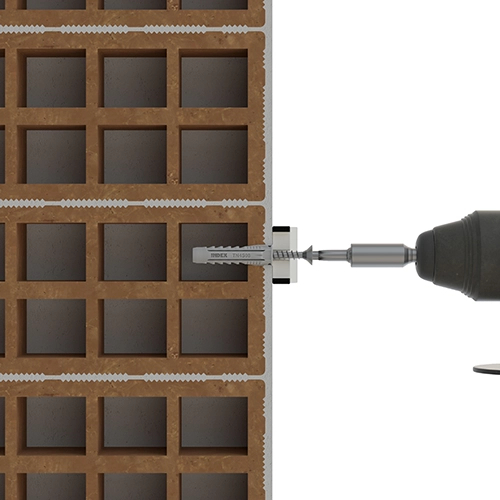 Paso 5 fijación con taco de Nylon® TN4S en ladrillo hueco del soporte y del anclaje con atornillador automático