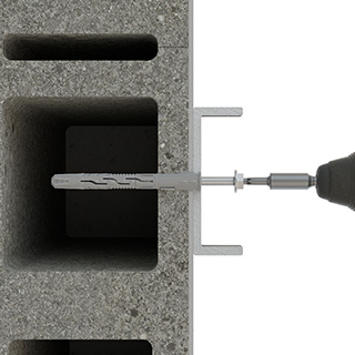 Paso 5 instalación fijación T-NUX con atornillador